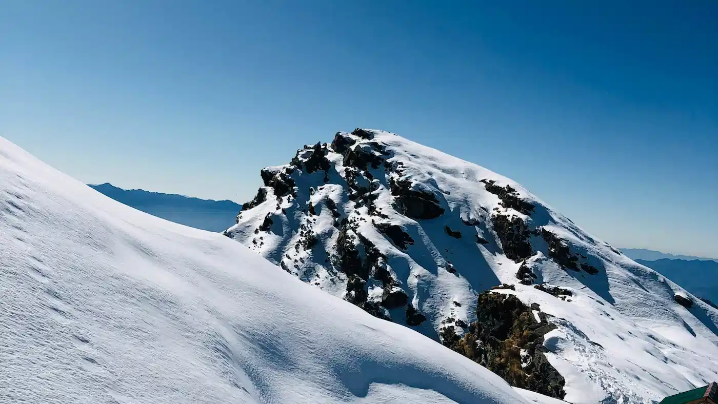 Snow-covered mountain view around Crystal Peak Chopta