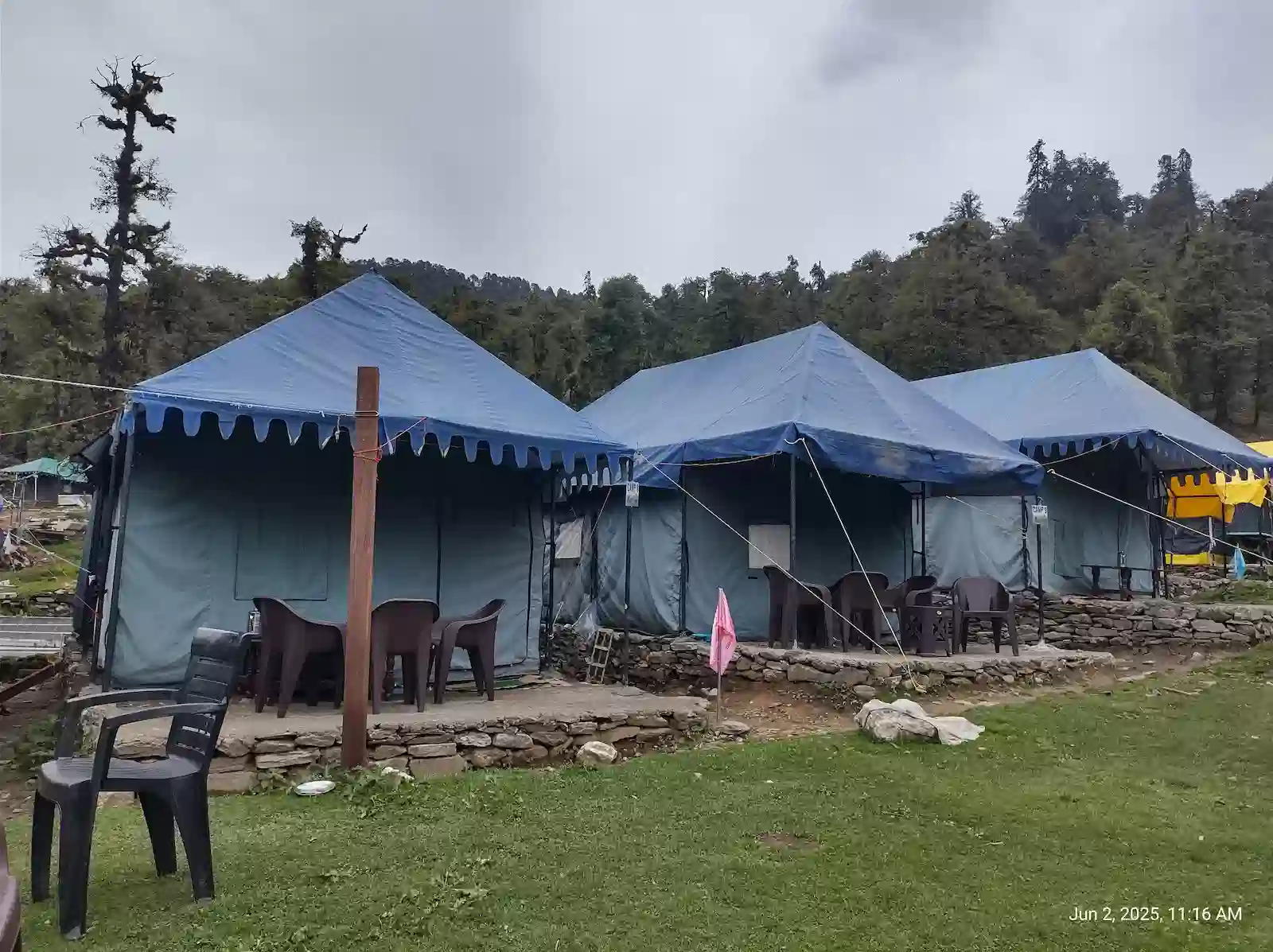 Crystal Peak Chopta camp with Himalayan mountain backdrop